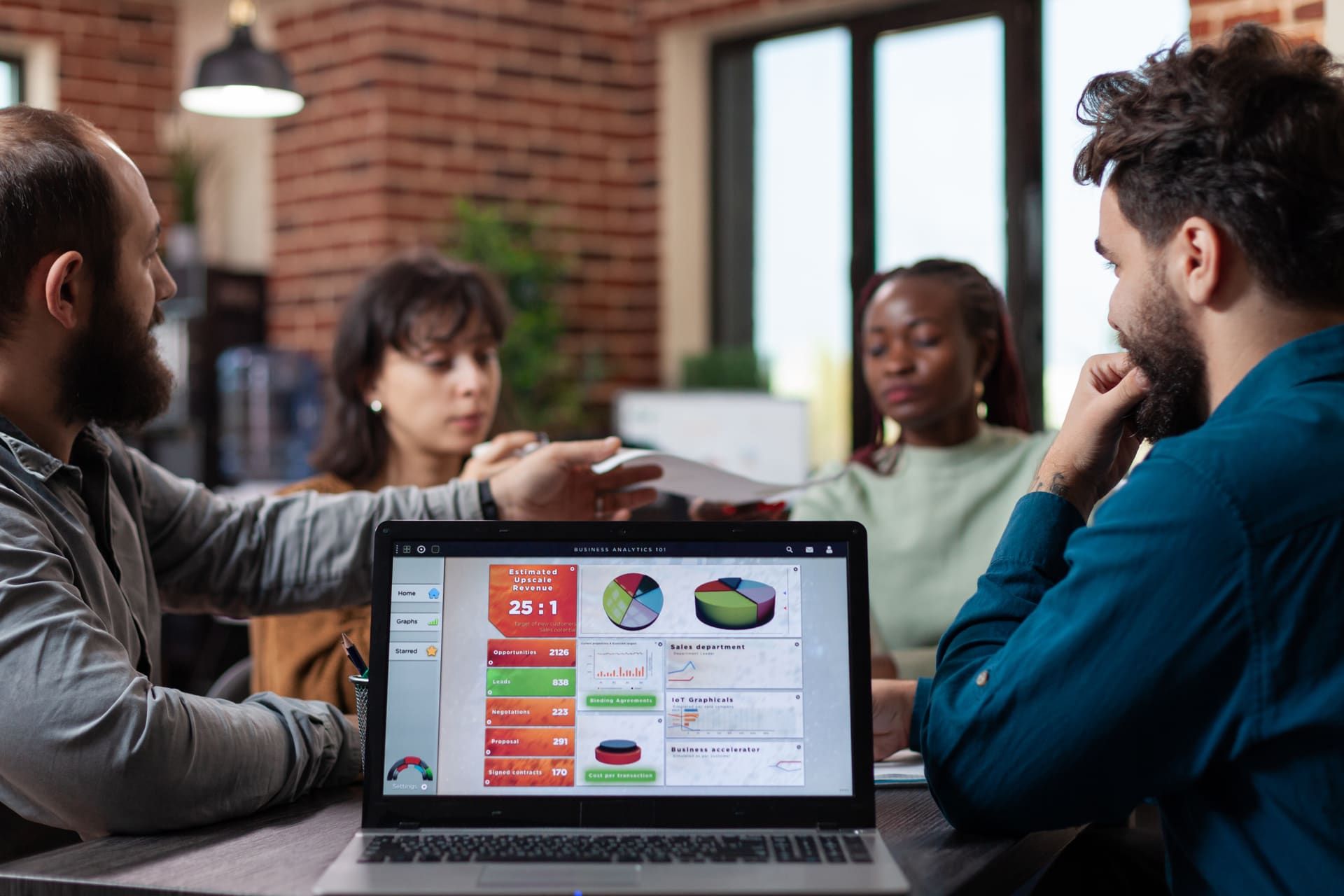 Marketing team reviewing social content calendar